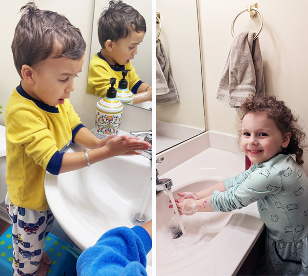 Two children clean their hands