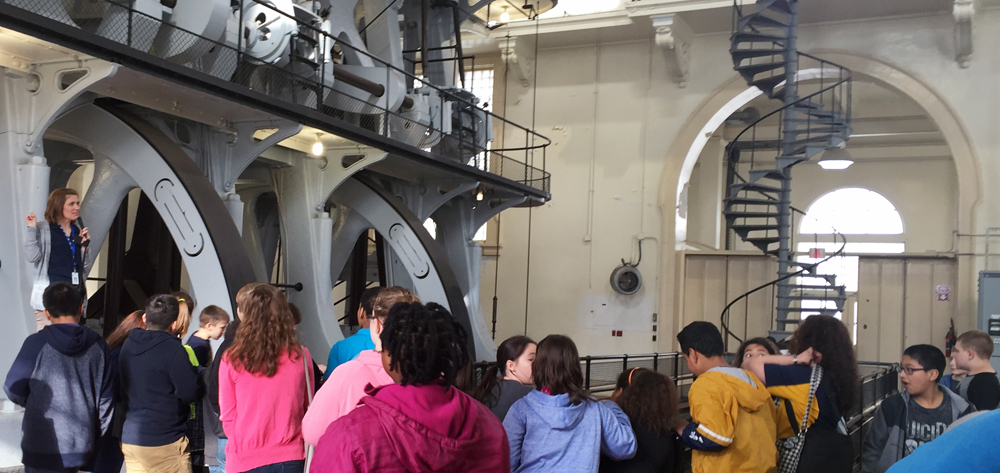 Group of students touring the pump house.