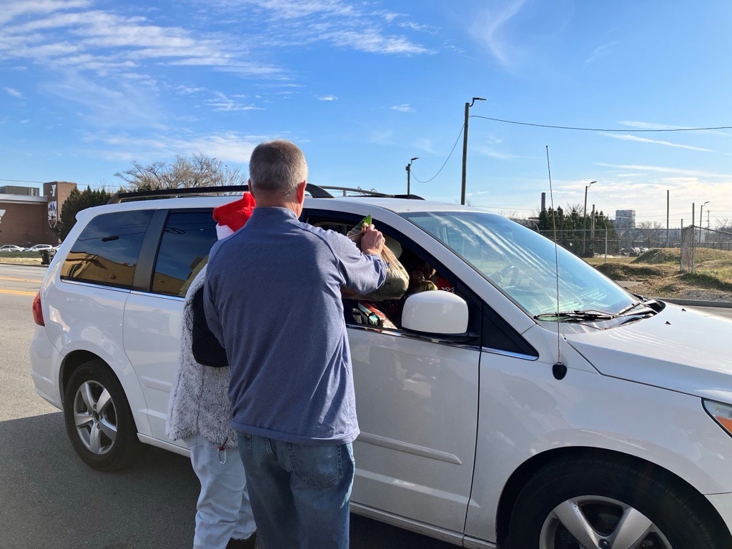 Lou Water - holiday meals drive-up RESIZE West Louisville - Rev. Sutton's holiday meals giveaway