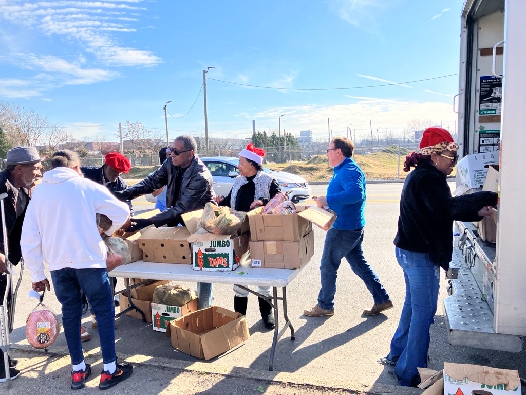 Lou Water - holiday meals giveaway RESIZE West Louisville - Rev. Sutton's holiday meals giveaway