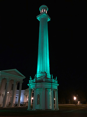 Louisville Water tower in green light