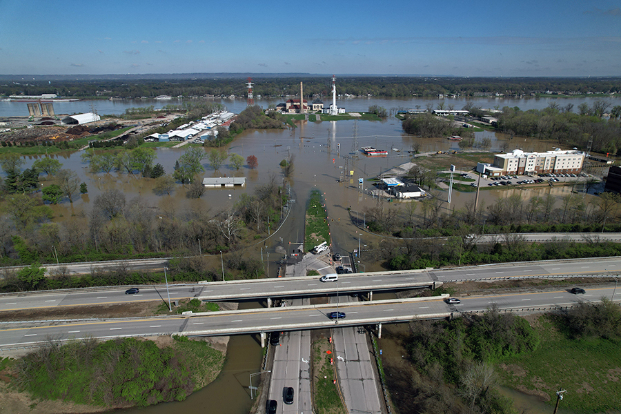 April 2025 - Cars drive along I-71, above flooded area on River Road and Zorn Avenue.