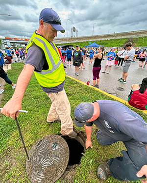 Crew helping with water stop