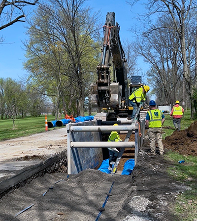 Louisville Water crew on river road