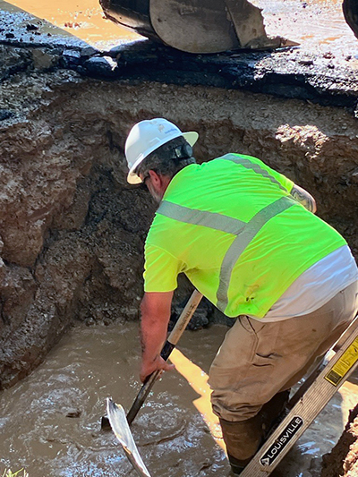 Construction crew digging