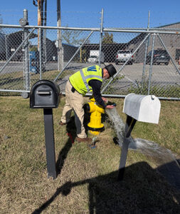 Hydrant flushing at crash site