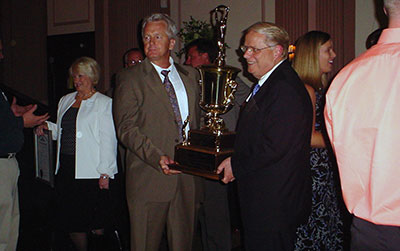 Billy Meeks and John Huber with award