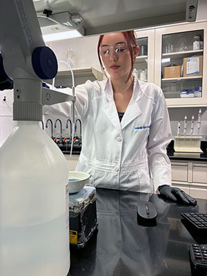 Julia Coke in Louisville Water lab