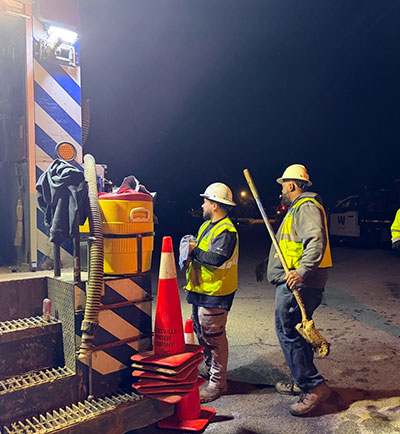 Crew fixing a main break