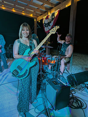 LaFollette playing bass in local band