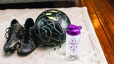 Pure Tap bottle with soccer cleats