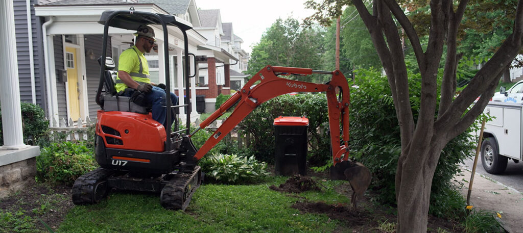 Contractor on backhoe