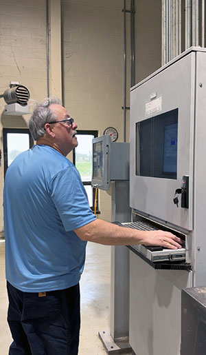 Brian Farmer monitoring water levels