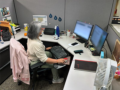 Judy Chodyniecki at her desk