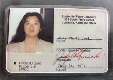 Judy Chodyniecki's first employee badge at Louisville Water