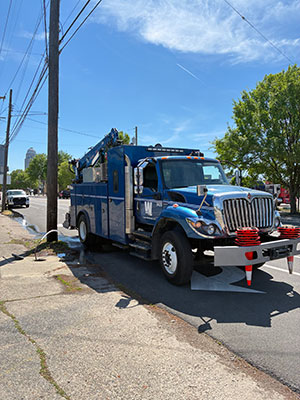 Louisville Water truck next to water stop flushing
