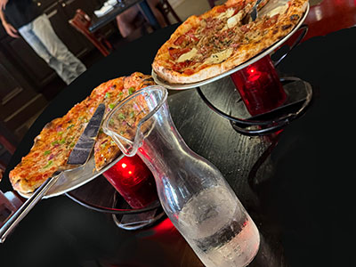 COALS pizzas with Pure Tap